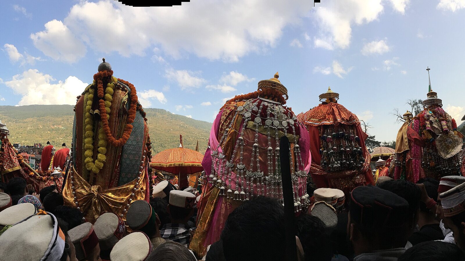 Decorated deity palanquins and festival structures at Kullu Dussehra.